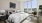 a bedroom with a large window