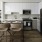 a kitchen with white cabinets