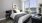 a bedroom with a large window