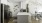 a kitchen with a table and chairs