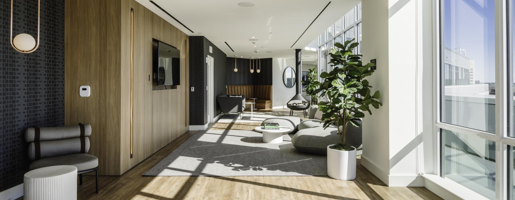 spacious hall and lounge area with a TV