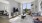 a living room with a tv and furniture