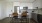 a kitchen with white cabinets