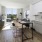 a kitchen with a dining table