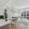 kitchen and living area with large windows