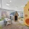 children's playroom with toys and large windows