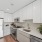 kitchen with white counters and stainless steel appliances