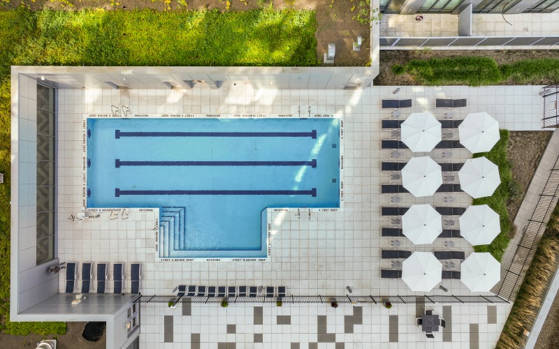 pool deck with resort style lounge seating
